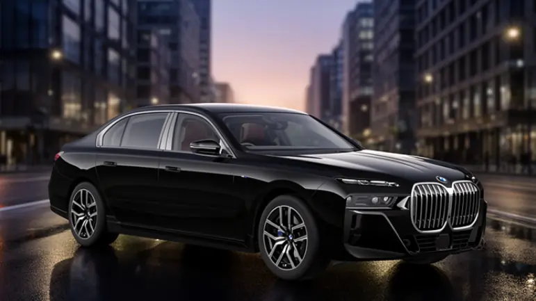 BMW 7 Series luxury sedan driving on a city street with premium design and signature kidney grille