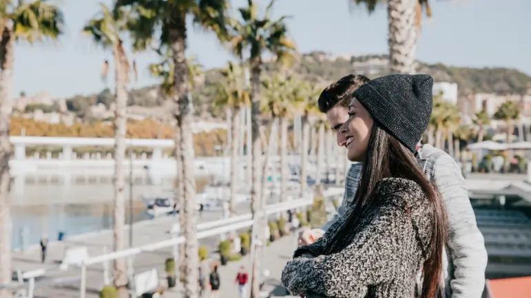 Couple enjoying city views during an Abu Dhabi sightseeing tour showing popular tourist attractions and travel experience in Abu Dhabi